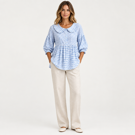Sky blue gingham Peter Pan collar blouse on slim adult model, studio