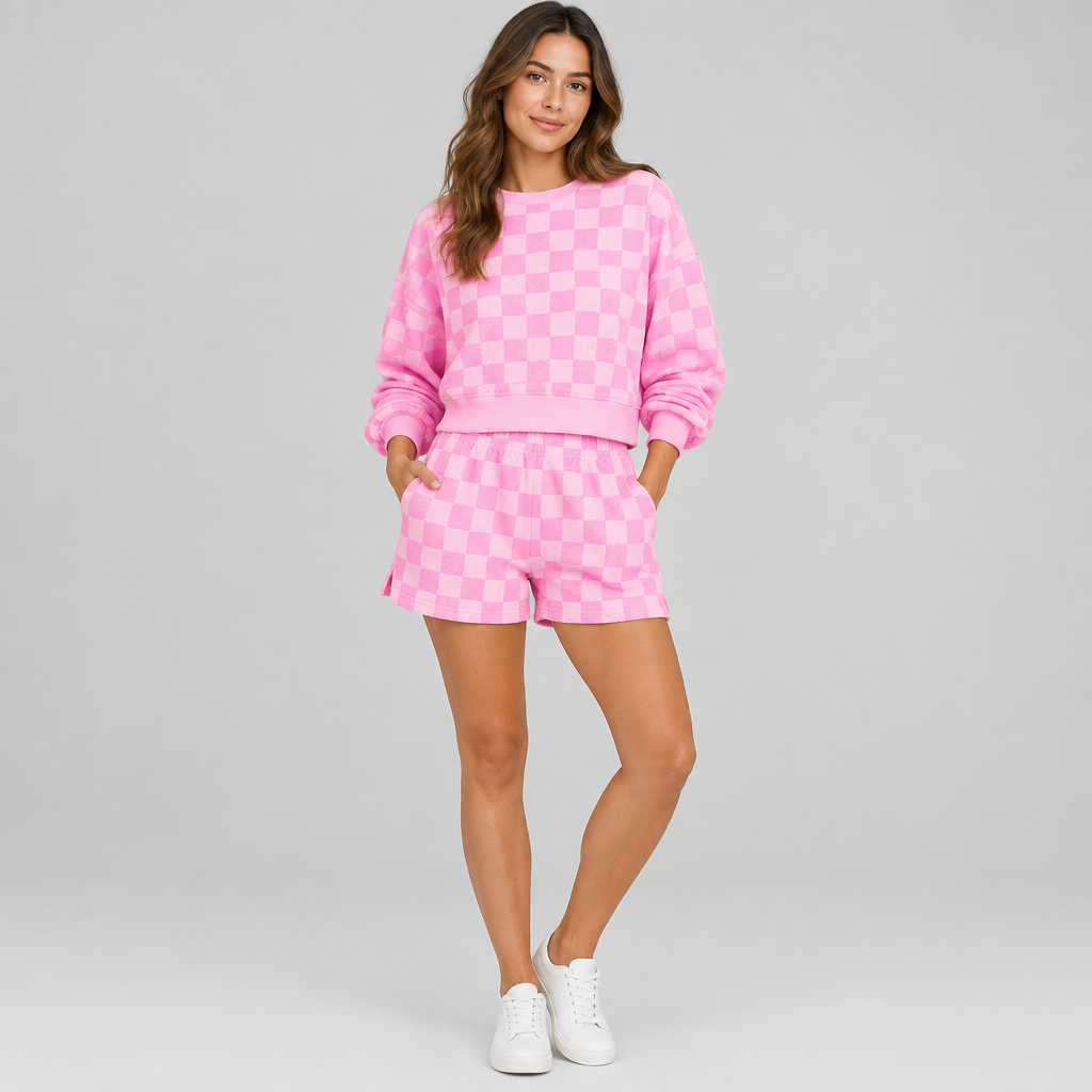 Pink checkerboard top and shorts set, studio profile