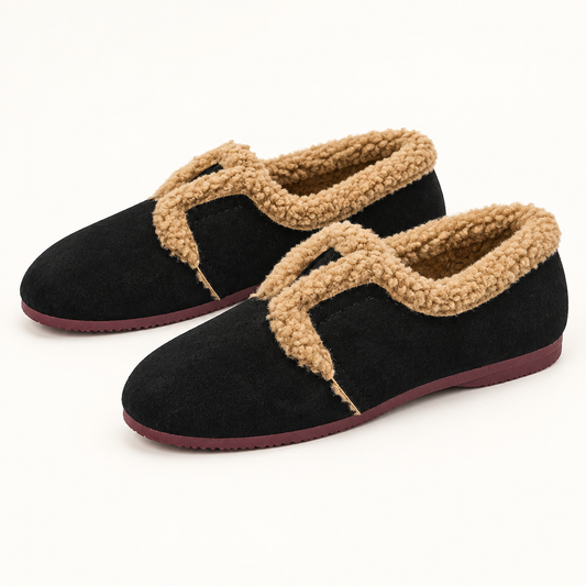Black faux fur lined slip-ons, studio view