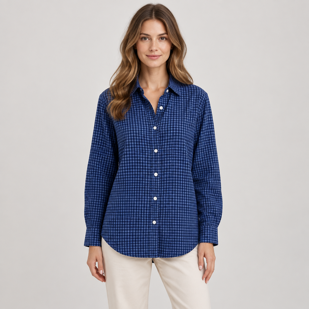 Navy blue plaid button-up shirt on a slim adult model