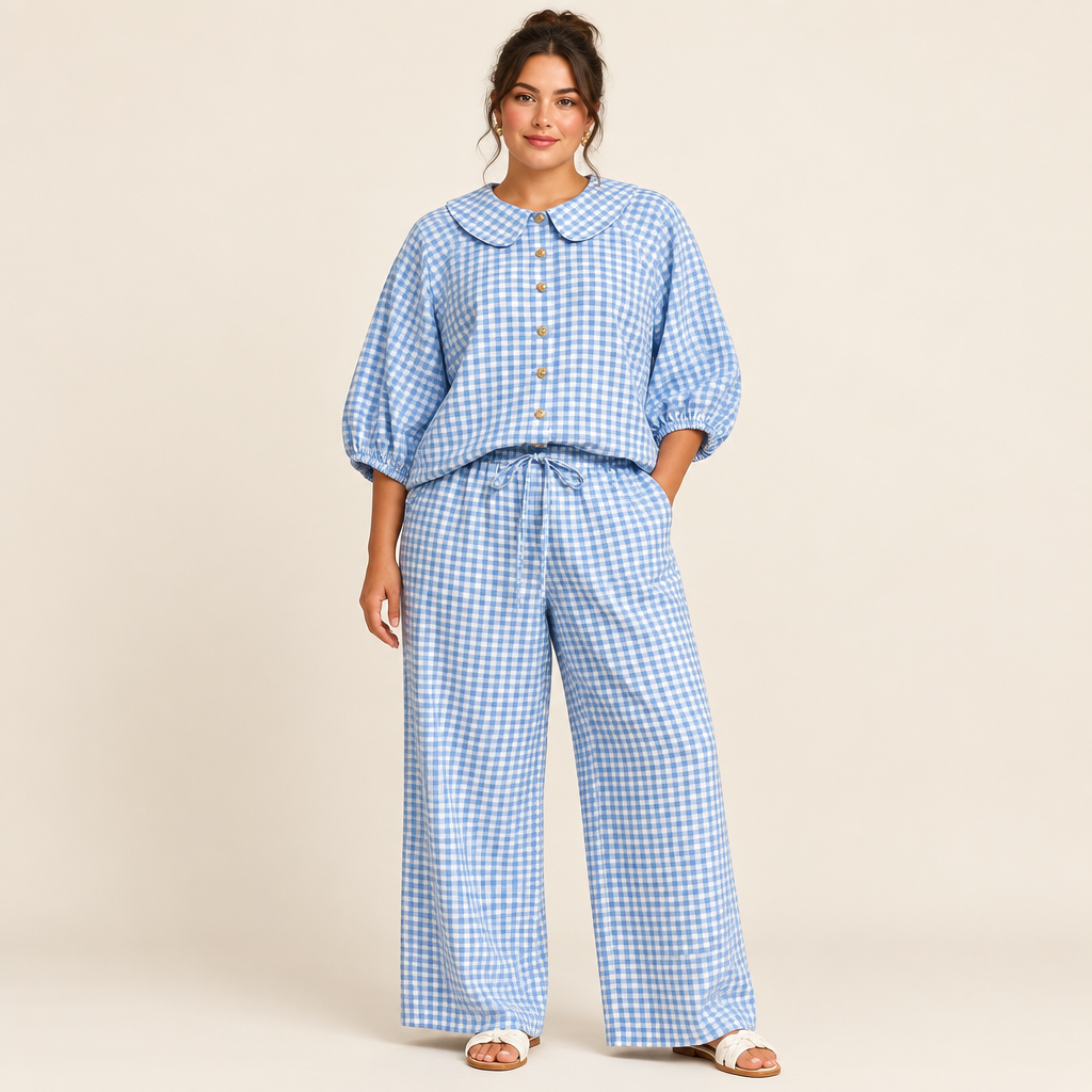 Light blue plaid button-up shirt and matching pants set in a studio view